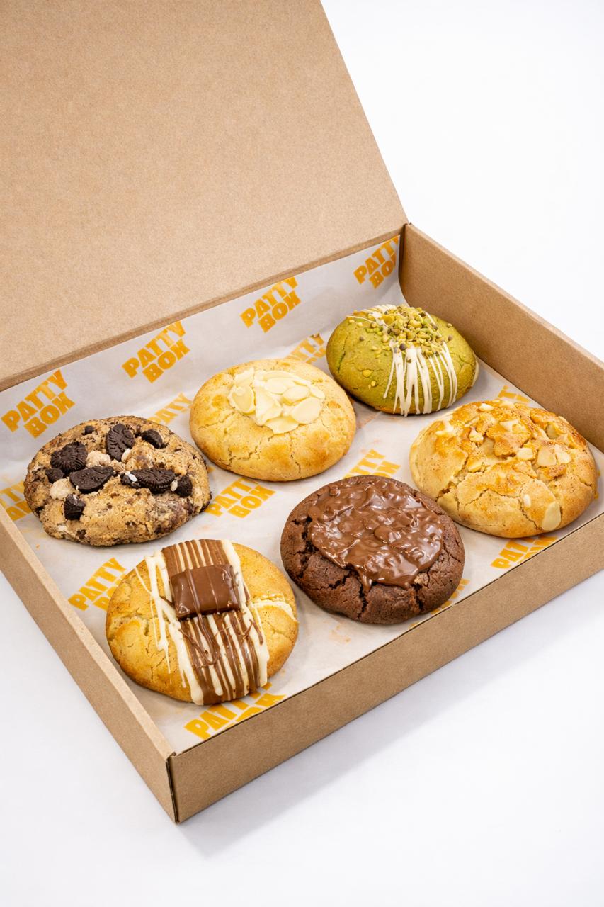 A cookie gift box from a Miami bakery, six oversized cookies arranged for delivery